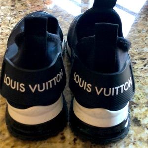 Authentic limited addition Louis Vuitton sneakers.